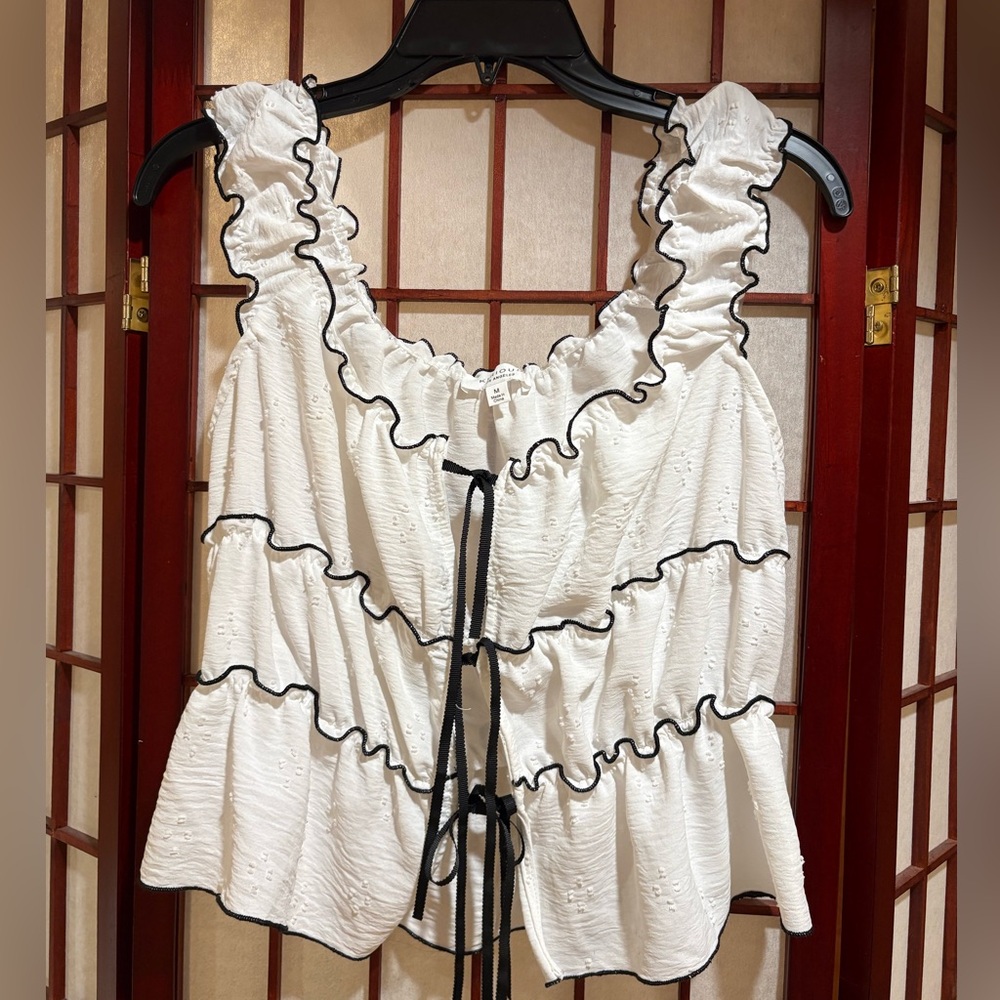 Ruffled White Tie-Front Tank Top with Black Trim